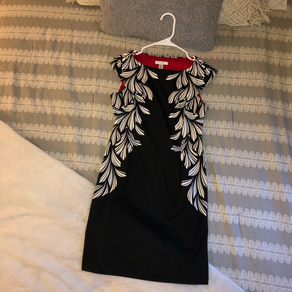 Black dress with white feather details
